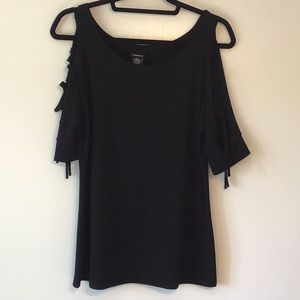 Torrid size L black top with sleeve cutouts.